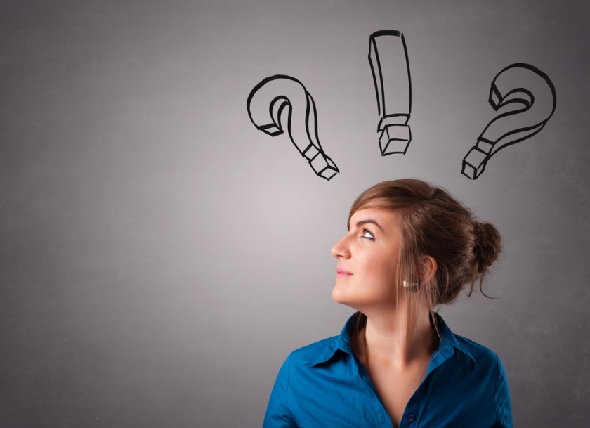 Beautiful-young-lady-thinking-with-question-marks-overhead