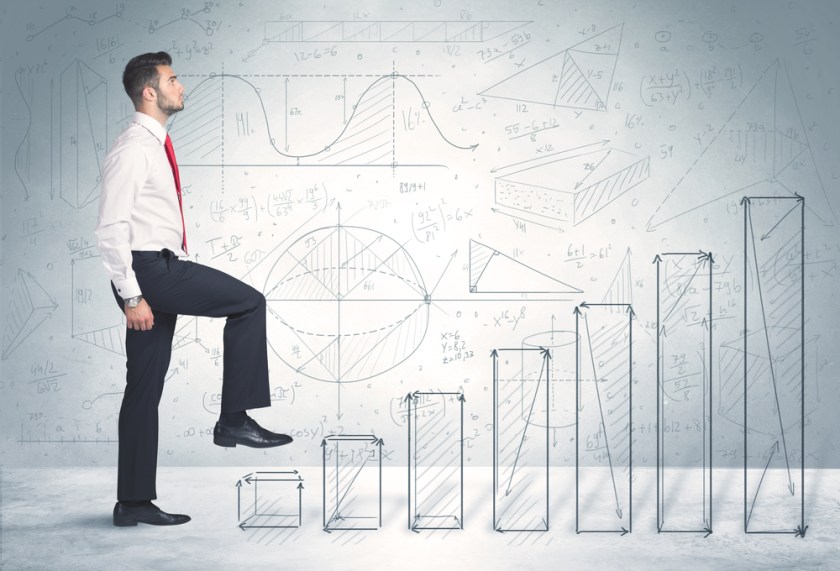 Business-man-climbing-up-on-hand-drawn-graphs-concept-on-background-1