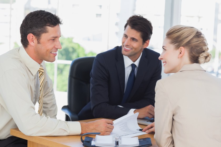 Business-people-smiling-during-a-meeting-in-the-office