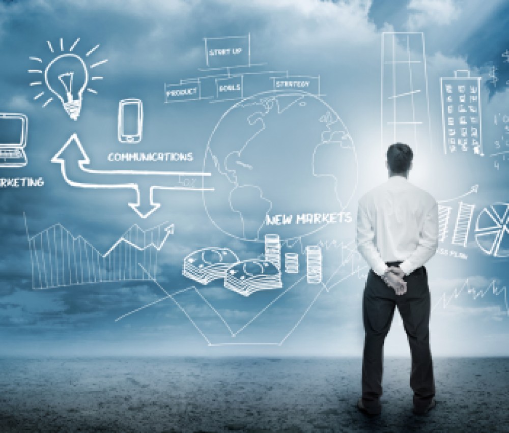 Businessman-considering-a-brainstorm-for-marketing-in-cloudy-landscape