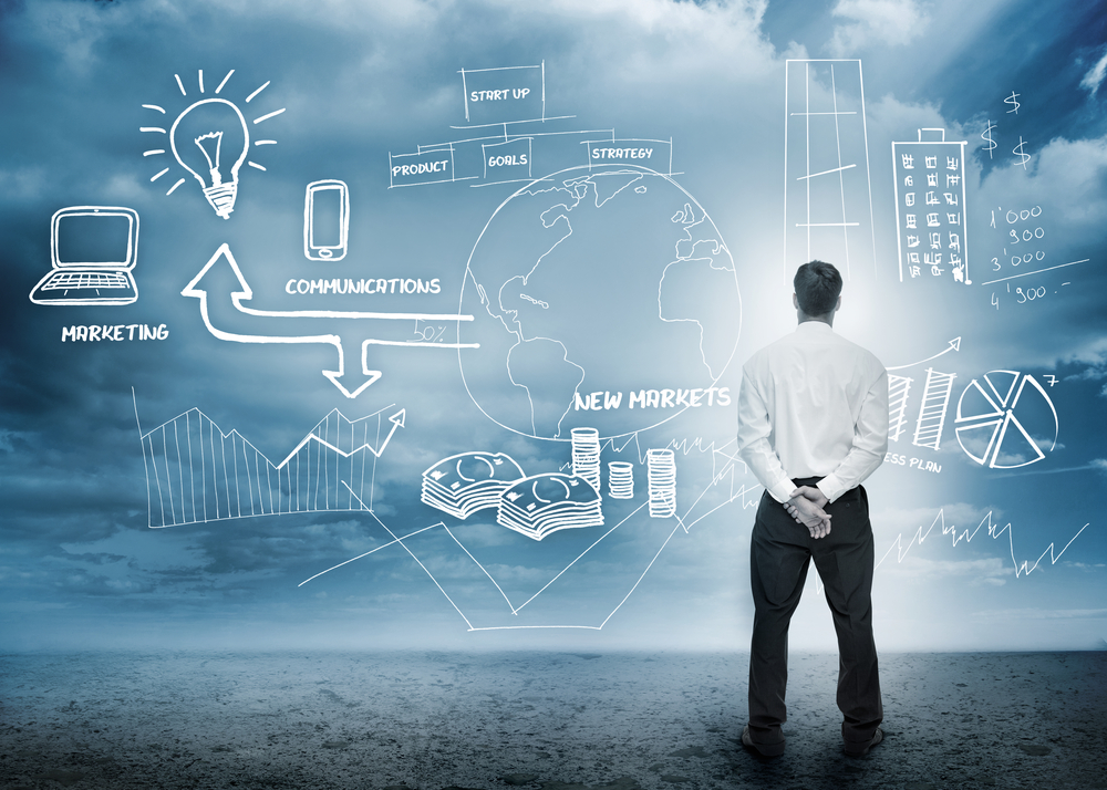 Businessman-considering-a-brainstorm-for-marketing-in-cloudy-landscape