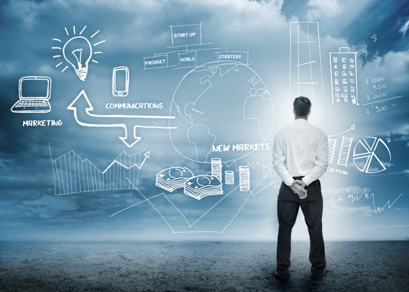 Businessman-considering-a-brainstorm-for-marketing-in-cloudy-landscape
