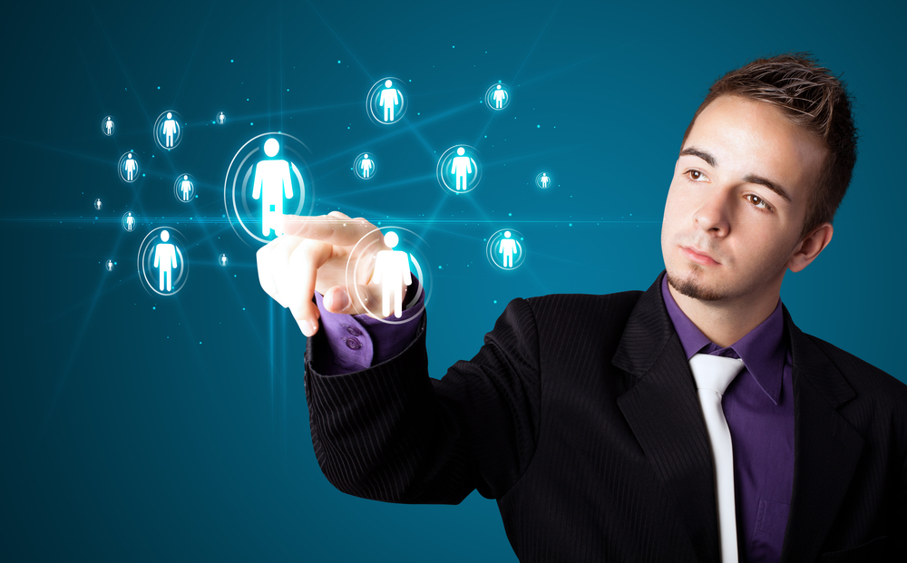 Businessman-pressing-modern-social-buttons-on-a-virtual-background