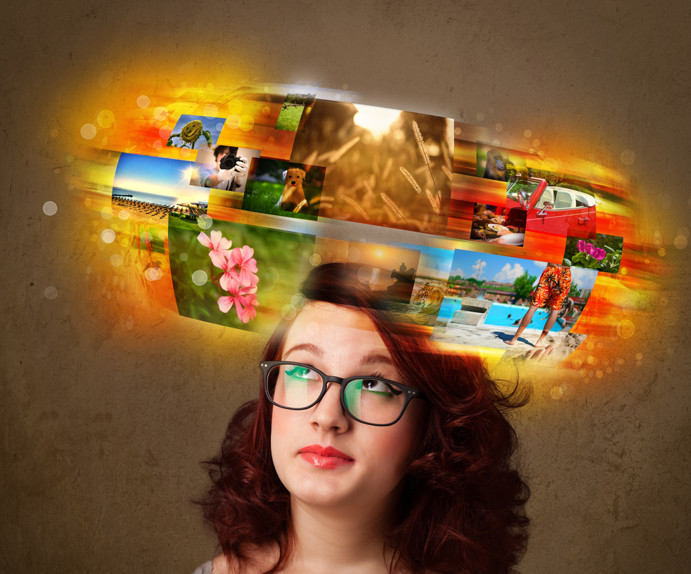 Cute-girl-with-colorful-glowing-photo-memories-concept