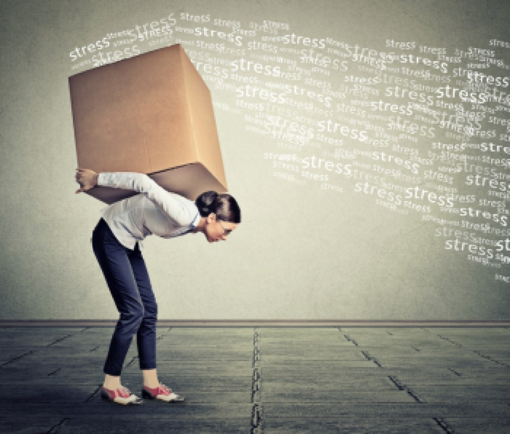 Stressed-woman-carrying-on-her-back-shoulders-large-box