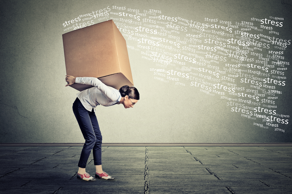 Stressed-woman-carrying-on-her-back-shoulders-large-box