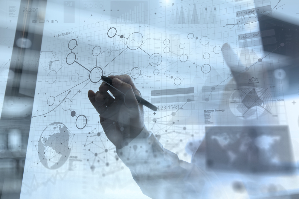 businessman-hand-working-with-modern-technology-and-digital-layer-effect-as-business-strategy-concept