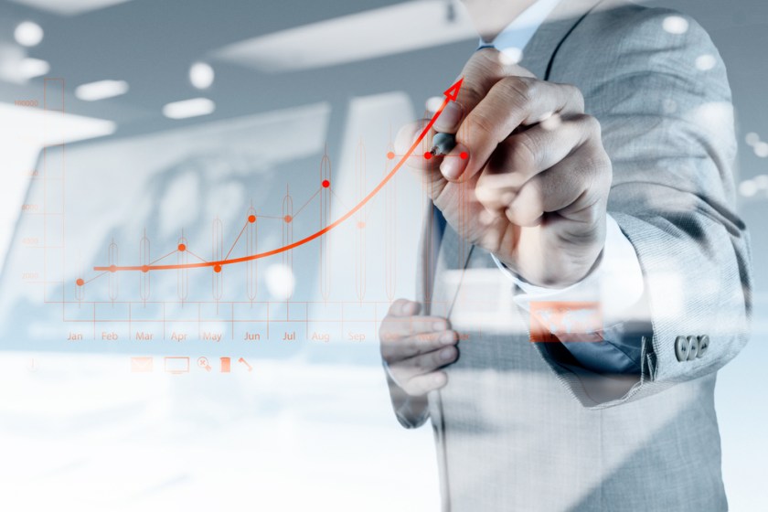 double-exposure-of-businessman-hand-drawing-virtual-chart-business-on-touch-screen-computer