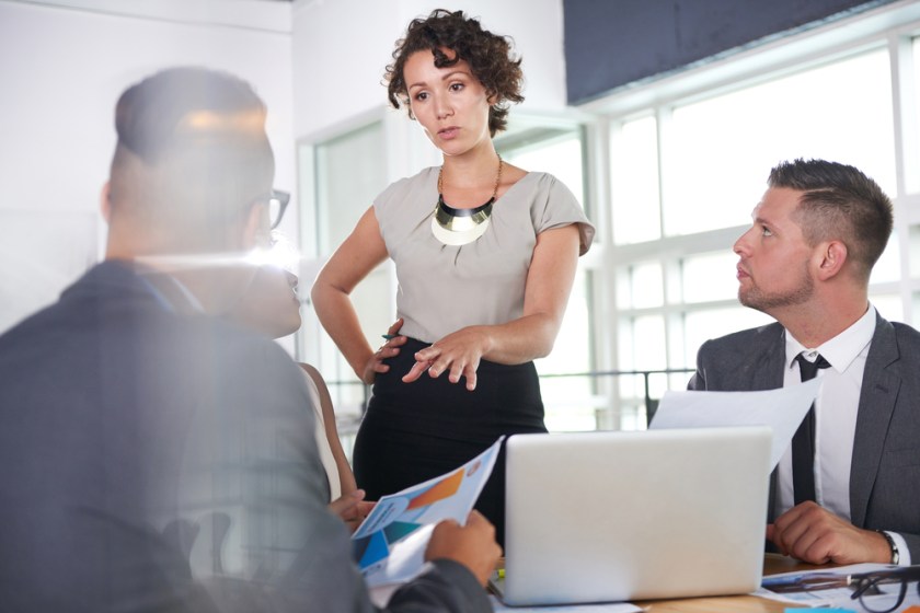 team-of-successful-business-people-having-a-meeting-in-executive-sunlit-office-2