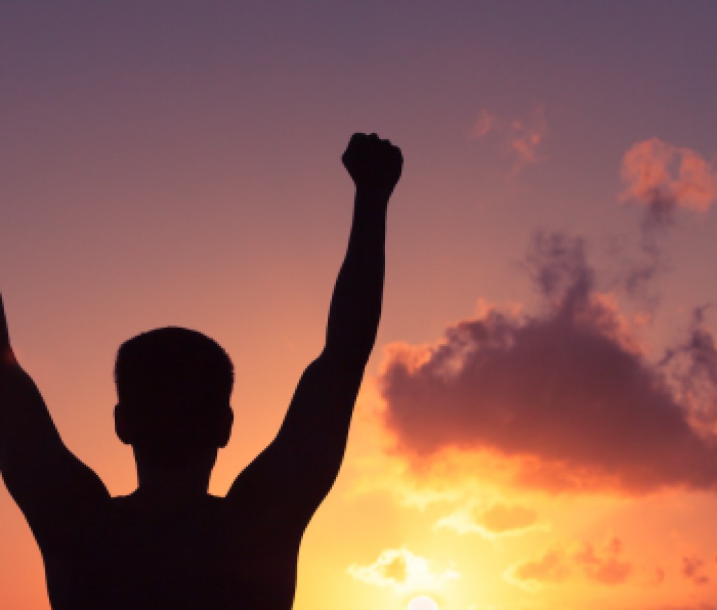 Winning and motivation. Young man feeling strong, victorious!
