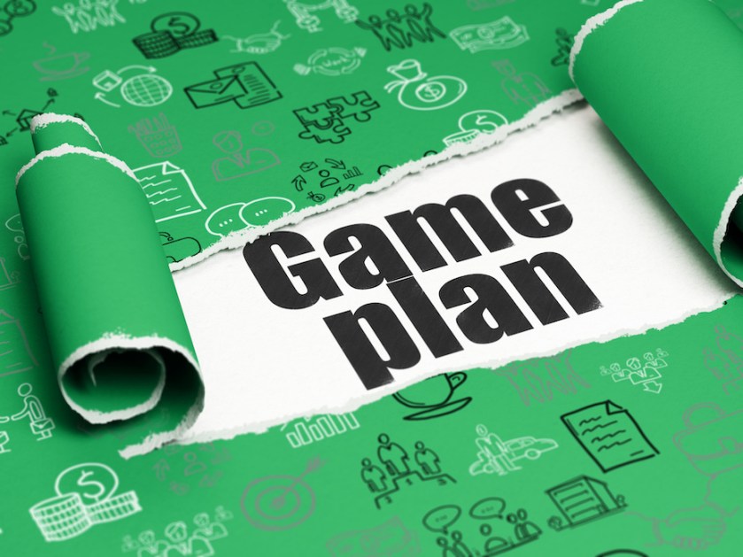 Business concept: black text Game Plan under the piece of torn paper