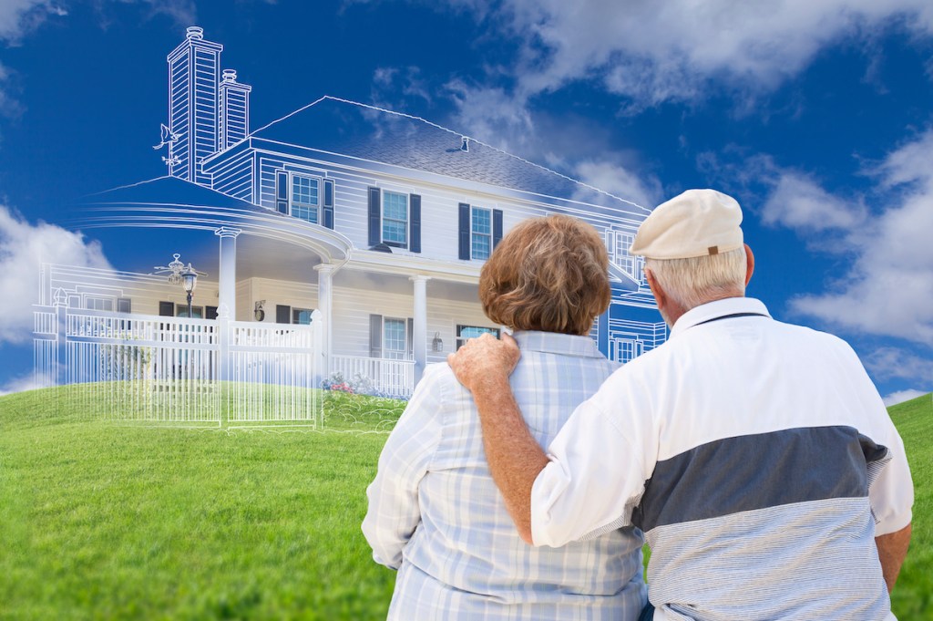 Senior Couple Faces Ghosted House Drawing, Partial Photo and Rolling Green Hills Behind.