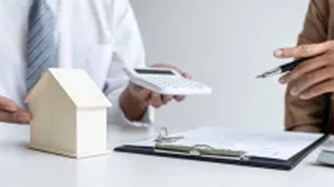 house-calculator-and-paper