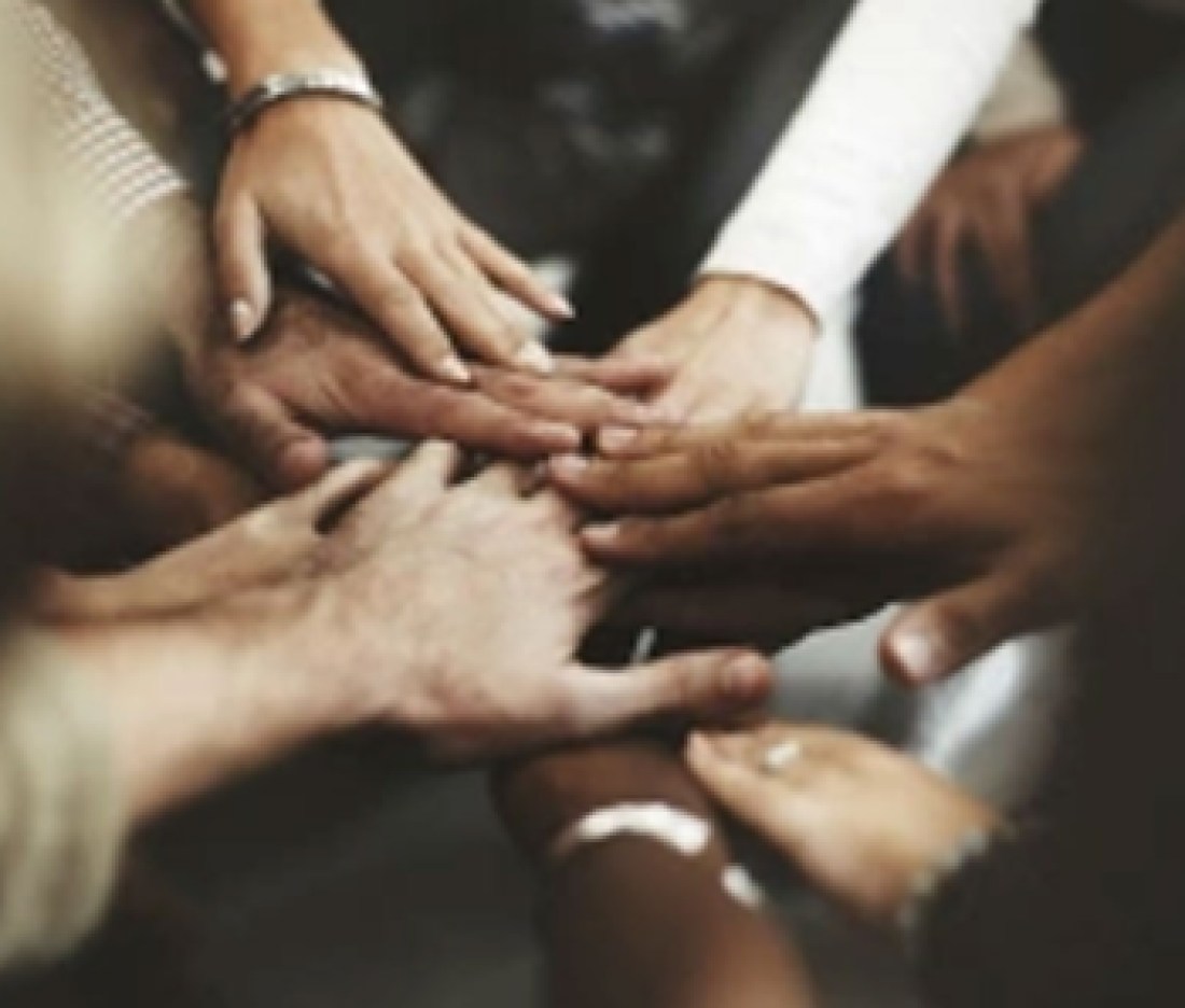 Team-hand-huddle