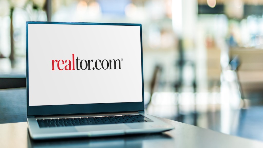 Laptop computer displaying logo of Realtor.com